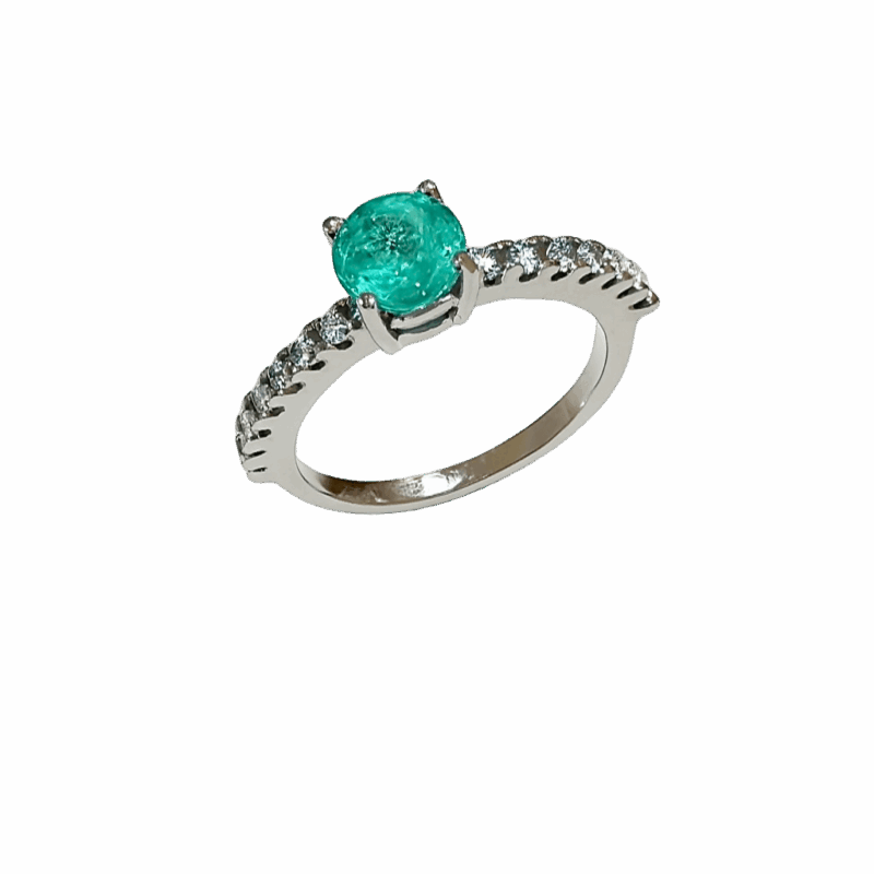 ANEL EM OURO BRANCO COM ESMERALDA E DIAMANTES