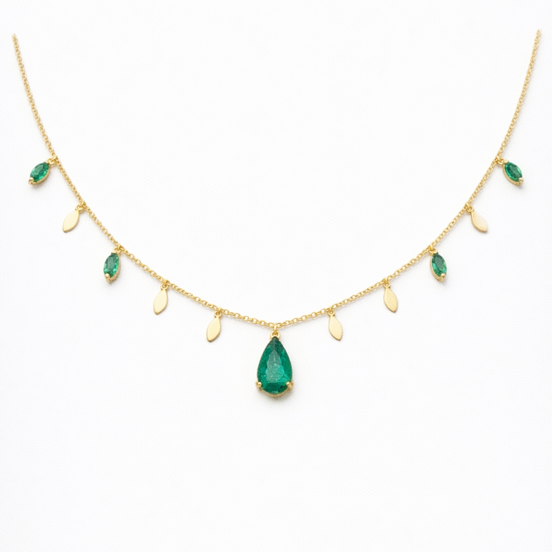 COLAR EM OURO 18K FOLHAS COM ESMERALDAS